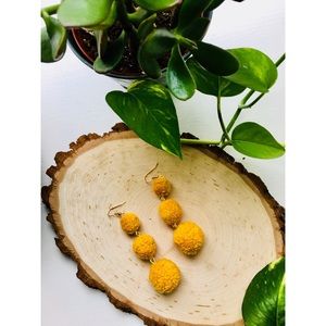Mustard colored Pom Pom earrings